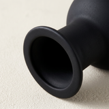 black vase rim close up