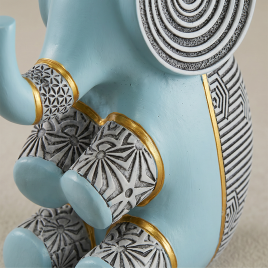 blue resin elephant legs gold detail