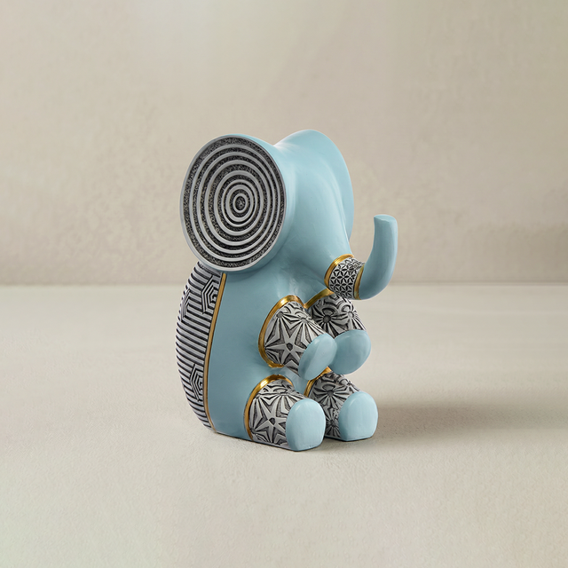 blue resin patterned sitting elephant studio