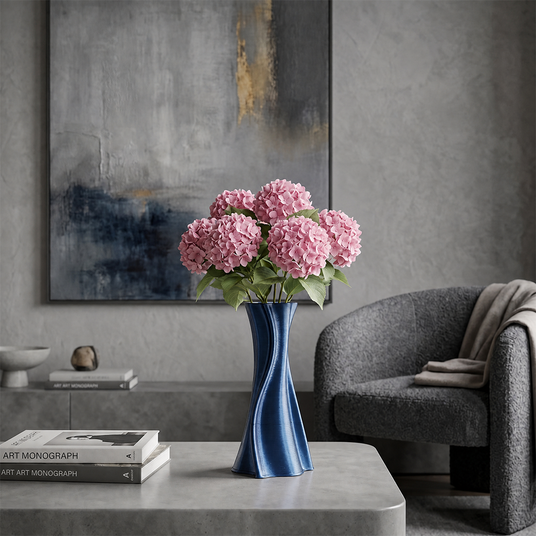 blue twisted vase with pink hydrangeas on coffee table