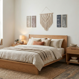 botanical signs above bed with macrame wall hanging