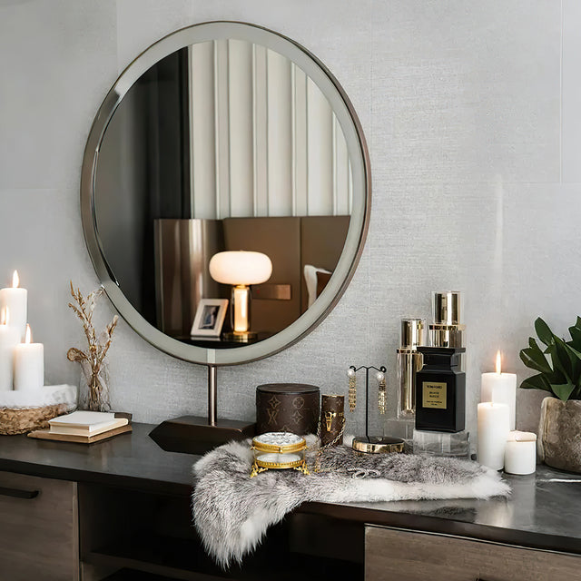 brass and glass carved decorative storage jar on the dressing table