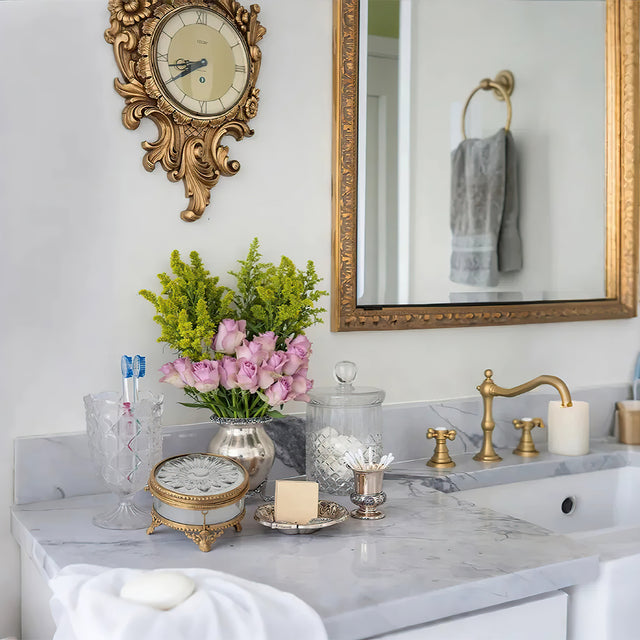 brass and glass carved decorative storage jar on the washing table in the bathroom