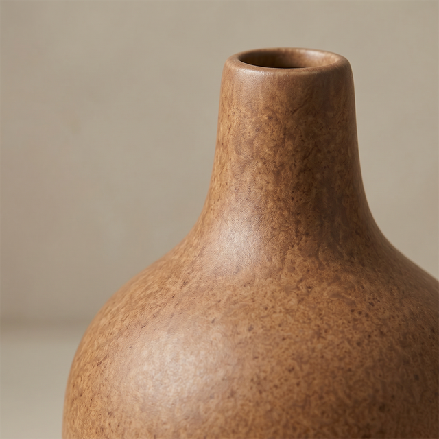 brown ceramic vase neck texture close up