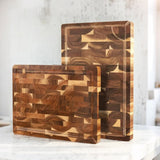 brown cutting board placed vertical on the  kitchen island