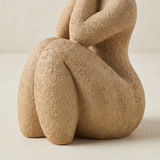 brown human sculptures