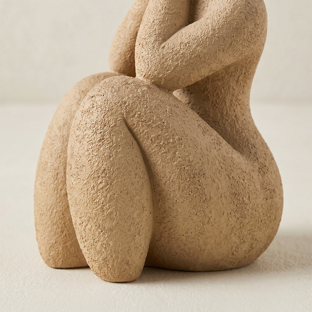 brown human sculptures