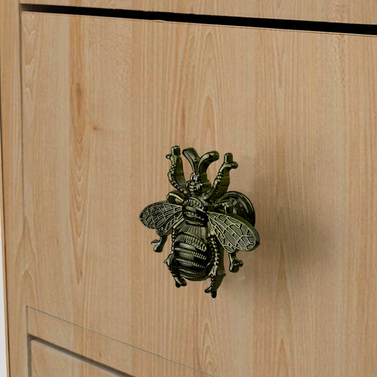 cabinet handle on wood
