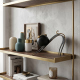 cat sculpture on wall shelf with vases