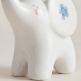 ceramic elephant face blue flower detail