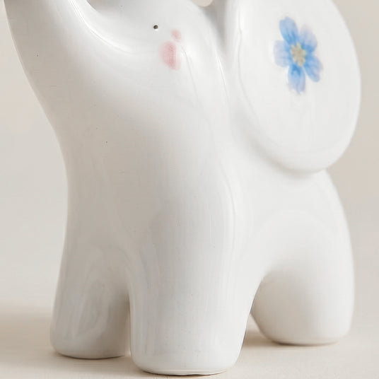 ceramic elephant face blue flower detail