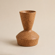 ceramic vase with textured surface on background