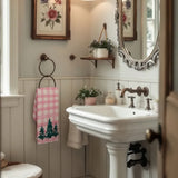 christmas tree dish towels hang on wall