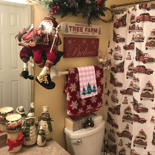christmas tree dish towels in bathroom
