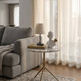 classical bust on side table in living room