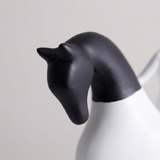 close up of black horse head sculpture