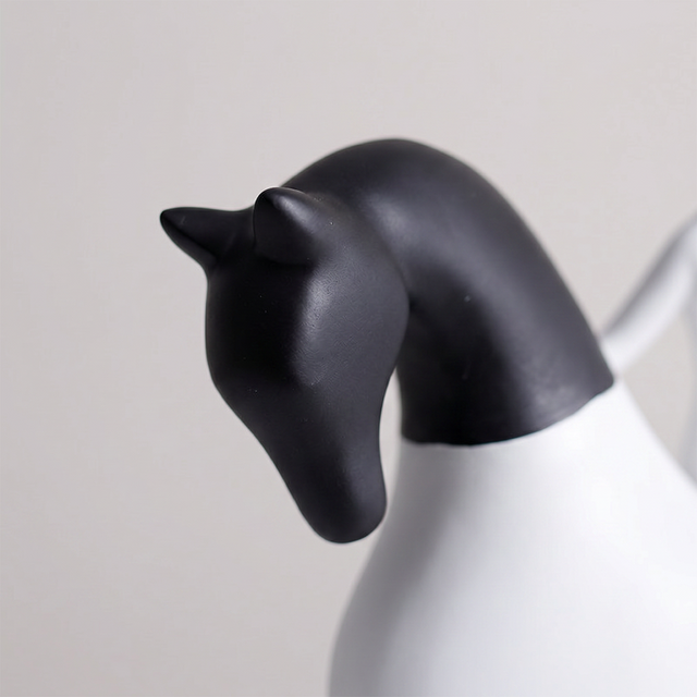 close up of black horse head sculpture