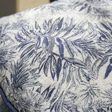 close up of blue palm leaf jacquard fabric texture