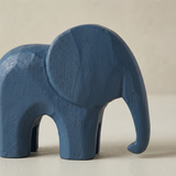 close up of blue wooden elephant figurine