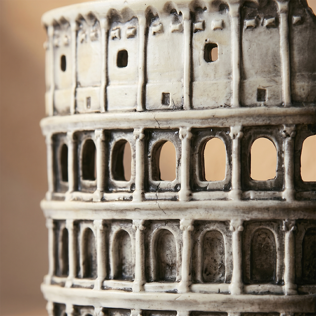 close up of colosseum bookend arch and columns