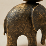 close up of elephant candle holder body and ear