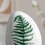 close up of fern leaf print on ceramic