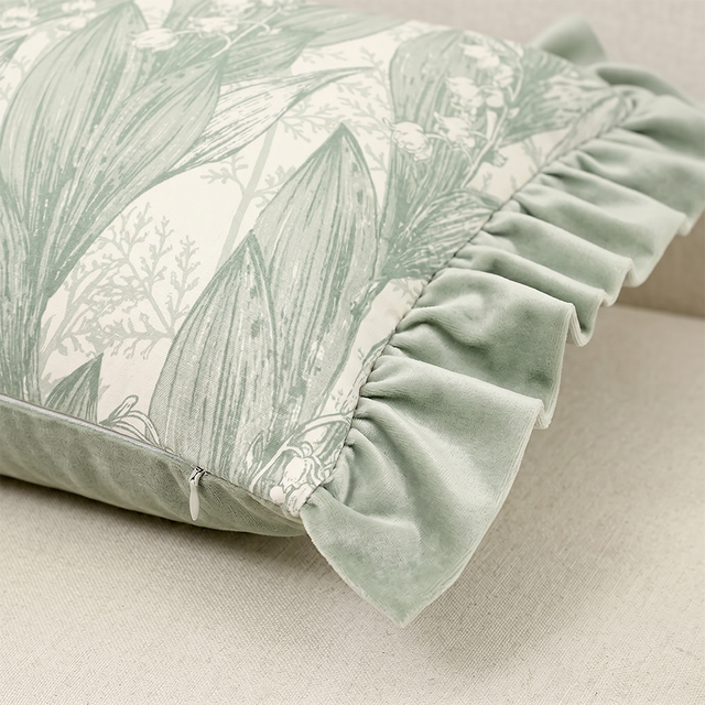 close up of green ruffle edge and zipper
