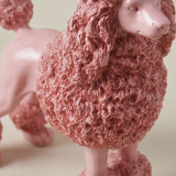 close up of pink poodle sculpture face
