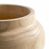 close up of round wooden vase rim