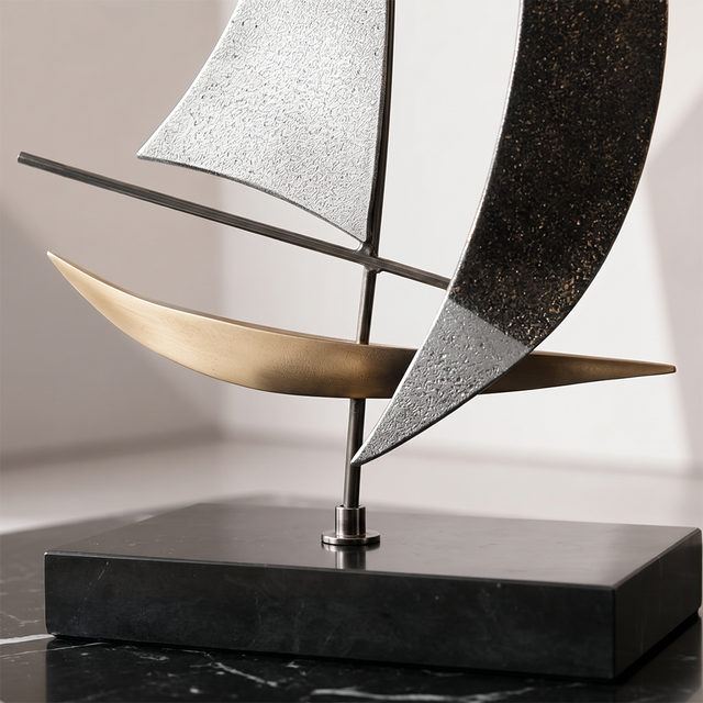 close up of sailboat sculpture base and hull