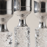 close up of silver candle holder top and crystal