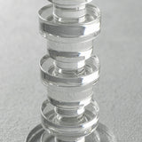 close up of stacked crystal candle holder rings