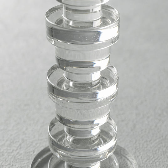close up of stacked crystal candle holder rings