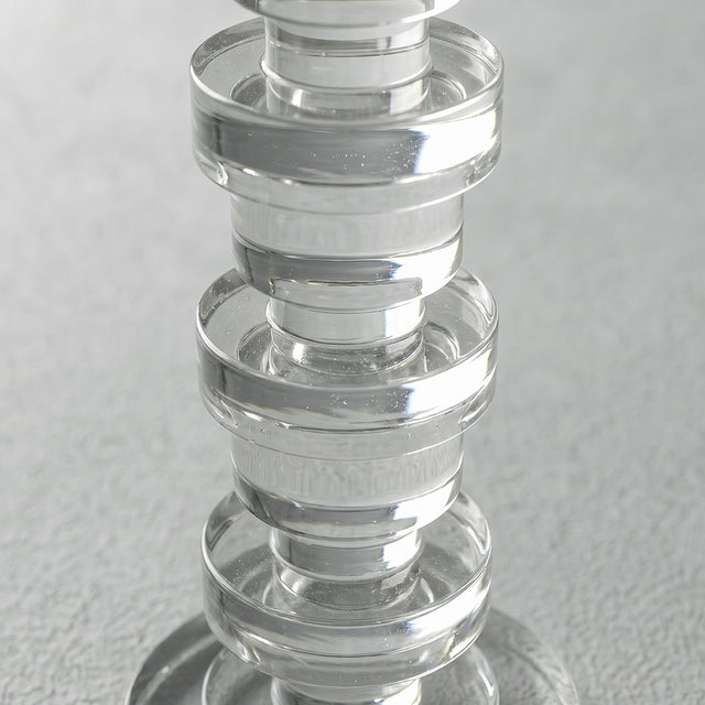 close up of stacked crystal candle holder rings
