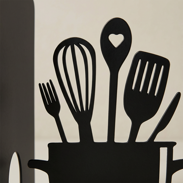 close up of utensil metal bookend silhouette