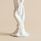 close up of white hand vase base and cuff