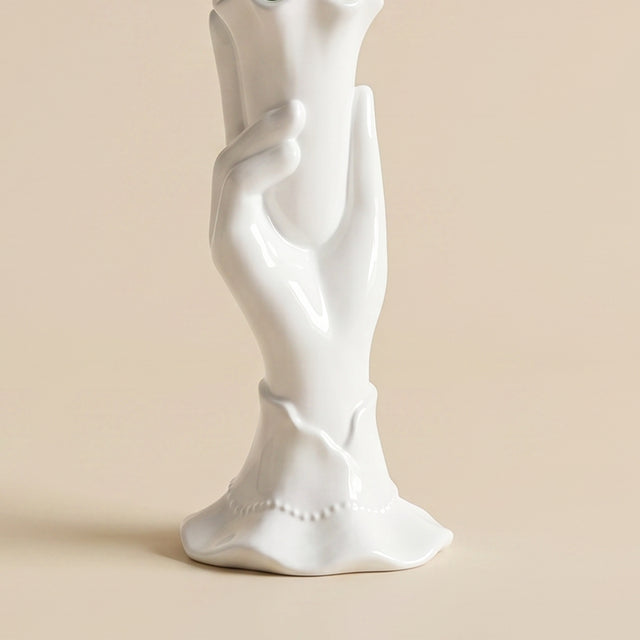 close up of white hand vase base and cuff