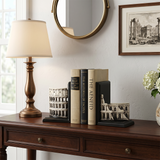 colosseum bookends on console table with lamp