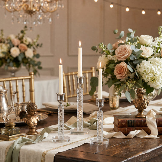 crystal candle holders with busts on event table