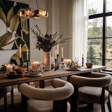 decorative glass stainless steel silver jar with a leaf shaped lid on the dining table