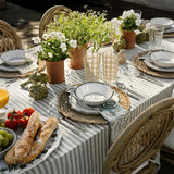 elegant gold rimmed drinking glasses on dining table