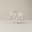 elephant sculpture on plain background