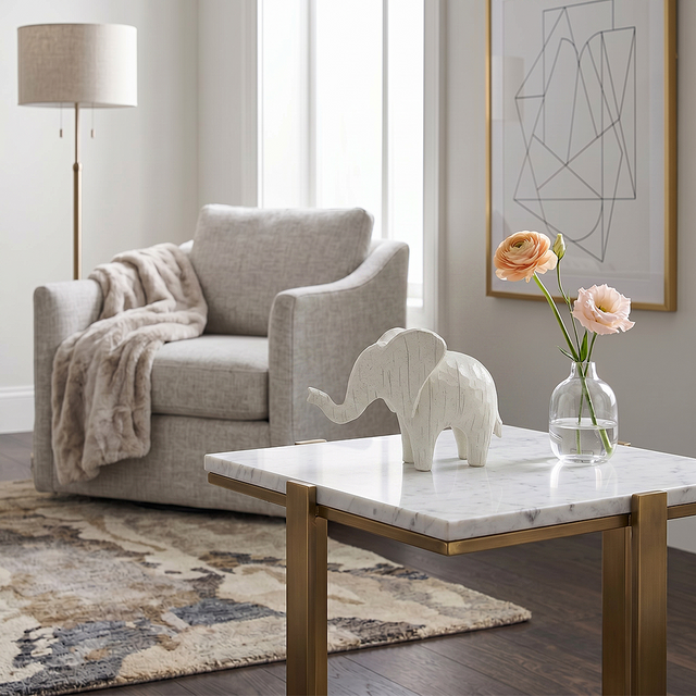 elephant sculpture on table near sofa