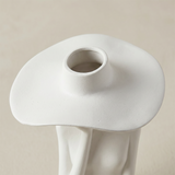 figure vase hat opening from above