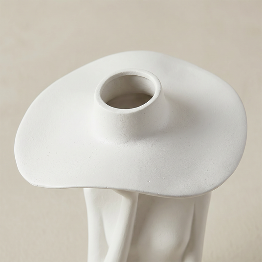 figure vase hat opening from above