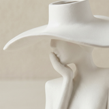 figure vase profile face close up
