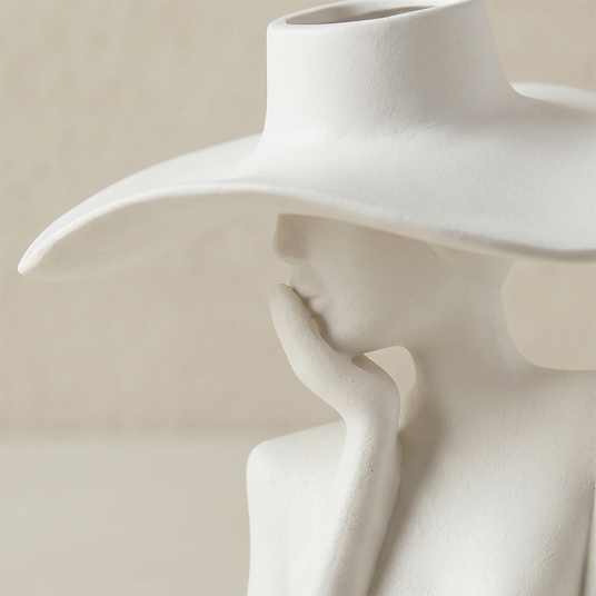 figure vase profile face close up