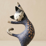 figurine standing cat side pose detail