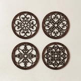 four dark wood round laser cut wall decor