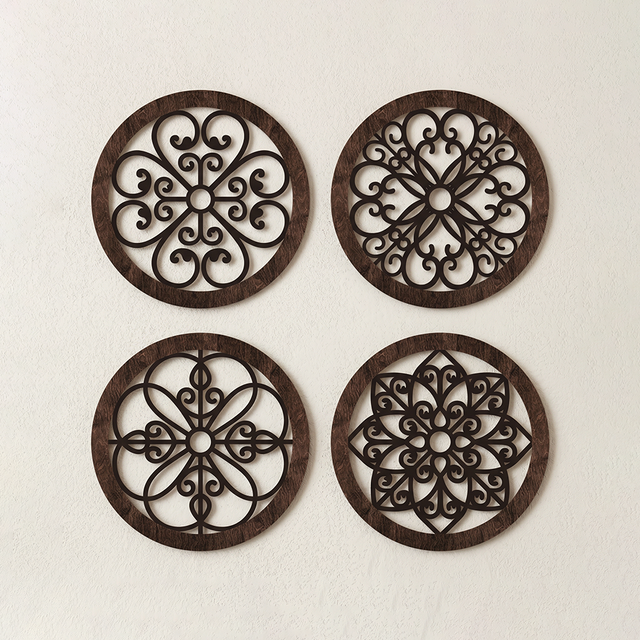 four dark wood round laser cut wall decor